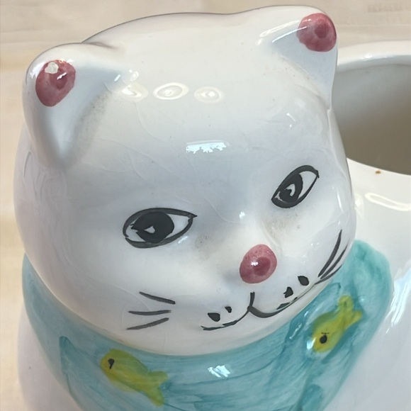 White Ceramic Cat-Shaped Planter with a Blue Scarf Adorned with Fish. - Picture 14 of 15